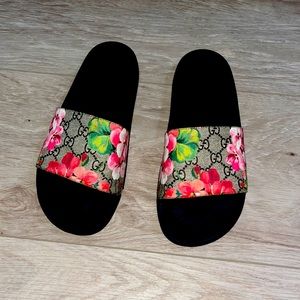 flowered Gucci flip flops